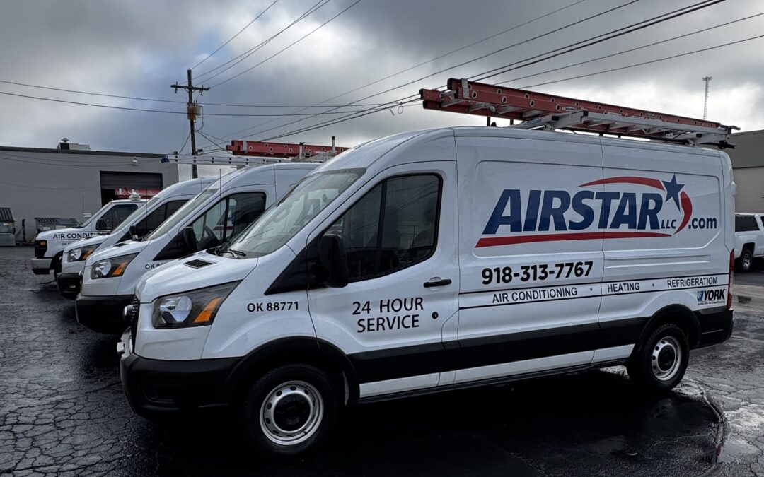 Airstar service vans in parking lot.